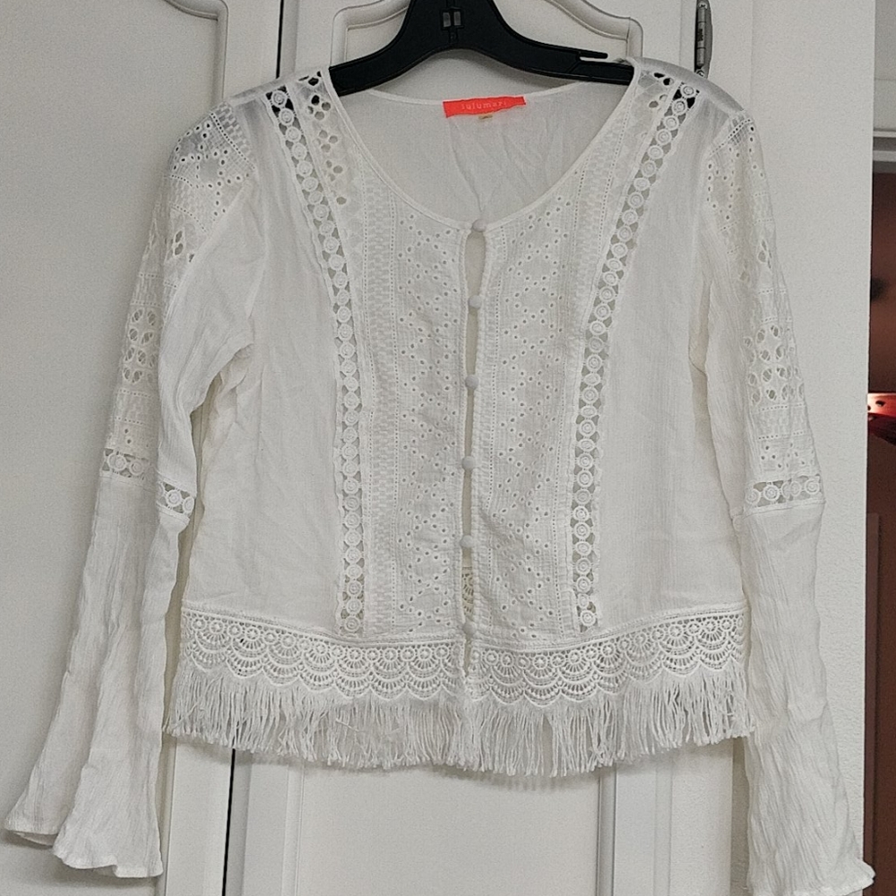 White shirt with fringe
